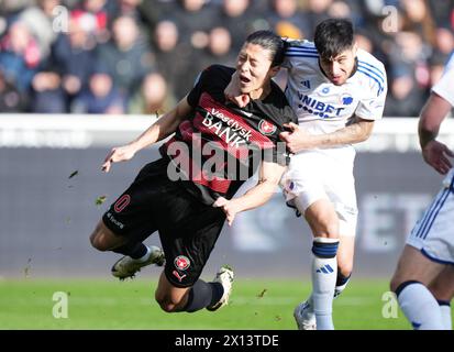 14 avril 2024, Herning, Danemark. Kevin Diks du FC Copenhagen et GUE-Sung Cho du FC Midtjylland dans le match de Superliga entre le FC Midtjylland et le FC Copenhagen au MCH Arena de Herning, dimanche 14 avril 2024. (Photo : Henning Bagger/Ritzau Scanpix) crédit : Ritzau/Alamy Live News Banque D'Images