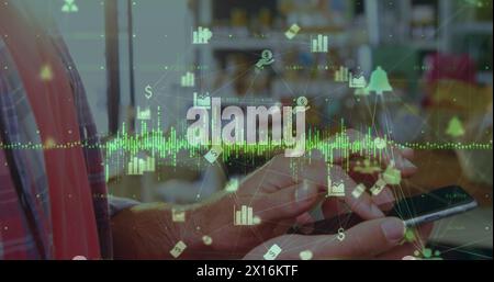 Image d'un texte de joyeux anniversaire et des bulles sur un groupe diversifié de joueurs de basket-ball au gymnase Banque D'Images