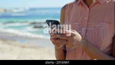 Image de qr code, lignes numériques avec des gratte-ciel sur une femme caucasienne utilisant le téléphone à la plage. Composite numérique, exposition multiple, technologie, ville, de Banque D'Images