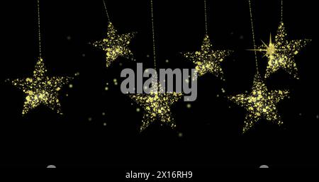 Image de points sur des étoiles dorées sur fond noir Banque D'Images