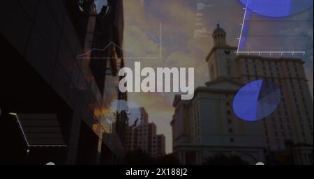 Image de globes, graphiques, langage informatique au-dessus d'une vue à faible angle des bâtiments contre le ciel nuageux Banque D'Images