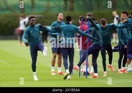 Bukayo Saka d'Arsenal lors d'une session de formation au Sobha Realty Training Centre à Londres Colney, Hertfordshire. Date de la photo : mardi 16 avril 2024. Banque D'Images