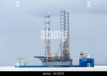 MV Xin Guang Hua est un navire semi-submersible de transport lourd exploité par COSCO Shipping Banque D'Images