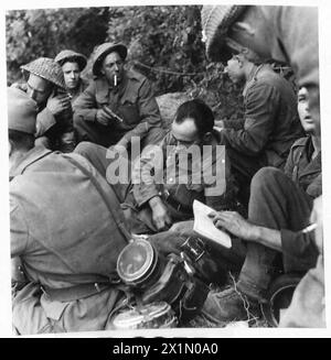 L'ATTAQUE AU SUD DE CAEN - prisonniers allemands de la 753ème Division Grenadiers, capturés à Boussigny. Ils ont été capturés par les troupes du Dorsetshire Regiment, et semblaient très heureux d'être entre nos mains, l'armée britannique, le 21e groupe d'armées Banque D'Images