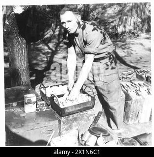 CINQUIÈME ARMÉE : ANZIO BRIDGEHEADSOLDIER EX-MINEURS AVIS DE GRÈVE DES MINEURS - Pte. E. Flecther - A.C.C. du 16 Bryngywn Street, Fleur de Lys, Pengam, Mon., employé pour travailler pour le Powell Duffryn Steam Coal Co., Bargoed Colliery, St.Wales. C'est un autre homme de dunkerque qui a servi en Tunisie après avoir participé aux débarquements d'assaut à Pantellaria, en S.Italy et à Anzio. Il dit : « je crois à frapper pendant que le fer est chaud, mais les grévistes devraient penser à leurs camarades servant à l'étranger. Les grèves à l'heure actuelle ne sont qu'un obstacle - pas une aide. Je changerai de place avec n'importe qui en bas des mines - mon travail co Banque D'Images