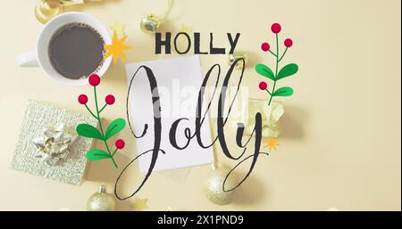 Une carte lisant Holly Jolly entourée de décorations de Noël Banque D'Images