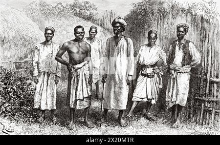 Hommes indigènes accompagnant l'expédition Victor Giraud, Tanzanie, Afrique de l'est. Dessin d'Edouard Riou (1833 - 1900) les lacs d'Afrique équatoriale, voyage d'exploration 1883-1885 de Victor Giraud (1858-1898) le Tour du monde 1886 Banque D'Images