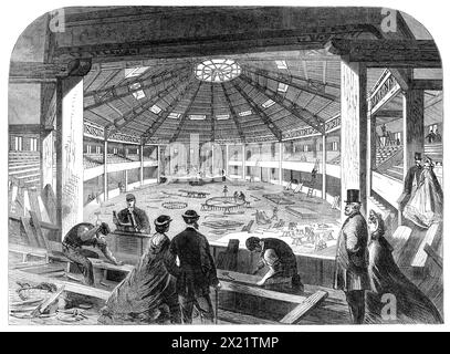 Pavillon Shakspeare à Stratford-on-Avon - intérieur, 1864. Bâtiment célébrant le tricentenaire de la naissance de William Shakespeare,'...designed par MM. Thompson et Colbourne... les entrepreneurs sont MM. Branson et Murray, de Birmingham ; et MM. Brothers, de Leamington, fournit les décorations internes... il est en bois, sur une fondation de maçonnerie ; en forme douze côtés, 152 pieds. en diamètre...et surmonté d'une lanterne pour la lumière et la ventilation. Le toit principal est construit de douze principaux encadrés, boulonnés aux poutres en bois verticales, sans lien horizontal, mais avec un solide continu Banque D'Images