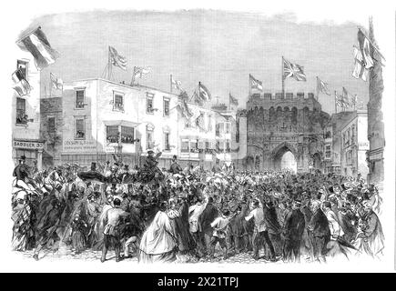 Garibaldi en Angleterre : arrivée de Garibaldi à la mairie, Bargate, Southampton, 1864. Vue de '...le pittoresque vieux Bargate, à Southampton, à onze heures le lundi, avec une calèche-quatre, contenant Garibaldi, ses deux fils, Mr. Brinton, le maire de Southampton, et M. Seely, se dirigeant vers la mairie, au milieu des acclamations d'une foule de gens dans les rues. Tiré de "Illustrated London News", 1864. Banque D'Images