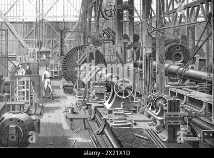 Une visite à Penn's Marine Engine Factory, à Greenwich : Turning a Cranank Axle, 1865. Illustration représentant «...l'opération de rotation d'un essieu à manivelle dans un tour puissant...les différents ateliers de montage et d'outillage de Greenwich sont construits sur les plans modernes les plus approuvés. Chaque partie de chaque atelier est entièrement éclairée dans toutes les directions, et les machines et les outils combinent toutes les améliorations les plus récentes. Les locaux couvrent sept acres de terrain, et y sont employés environ 1300 hommes et garçons. Ici toutes les pièces moulées sont faites, certaines d'une taille immense, de 20 à 30 tonnes de métal étant coulé dans certaines Banque D'Images