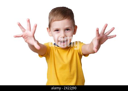 portrait d'un petit garçon avec une émotion, tout est super. veut effrayer Banque D'Images