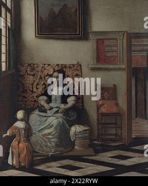 Intérieur avec une femme cousant et un enfant, 1662. De Hooch représente un intérieur typiquement hollandais. La mère est occupée à coudre mais s'occupe aussi de son petit fils. Ils sont situés dans la zone de la maison connue sous le nom de voorhuis, qui était reliée à l'extérieur et qui, lorsqu'elle n'était pas utilisée pour la conduite des affaires, était un espace pour les activités domestiques. La deuxième pièce, qui se connecte à celle-ci par une porte et une fenêtre intérieure avec une grille, est le binnenhuis, dans ce cas avec une grande cheminée. La femme est assise sur un dais ou soldertien qui offrait une protection contre le froid et l'humidité du sol, tandis que Behi Banque D'Images