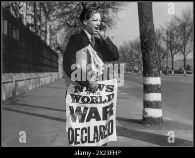 1939 GUERRE DE LA seconde Guerre mondiale DÉCLARÉE, vendeur de journaux britanniques crie la nouvelle que la guerre est déclarée à l'Allemagne nazie. The Embankment London UK. Nouvelles de l'annonce de la bannière mondiale. Seconde Guerre mondiale seconde Guerre mondiale septembre 1939 Londres Grande-Bretagne Royaume-Uni Banque D'Images