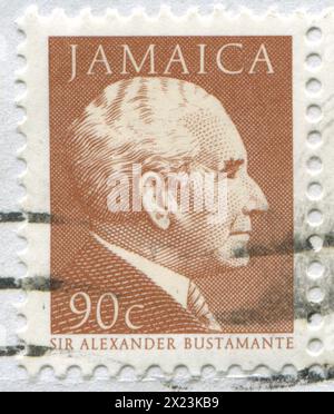 JAMAÏQUE - VERS 1987 : timbre imprimé par la Jamaïque, montrant Sir Alexander Bustamante, vers 1987 Banque D'Images
