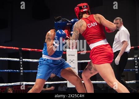 Pueblo, Colorado, États-Unis. 19 avril 2024. La canadienne Tammara Thibeault(Rouge) a remporté son combat de demi-finale dans la catégorie féminine des 75 kg contre Naomi Graham des États-Unis(Bleu) crédit : Casey B. Gibson/Alamy Live News Banque D'Images