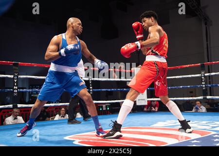 Pueblo, Colorado, États-Unis. 19 avril 2024. L'australienne Ikenna Enyi (Rouge) a remporté le match contre les États-Unis Jamar Talley (Bleu) après que l'arbitre ait arrêté le combat en demi-finale masculine de 92 kg. Crédit : Casey B. Gibson/Alamy Live News Banque D'Images