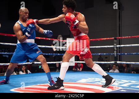 Pueblo, Colorado, États-Unis. 19 avril 2024. L'australienne Ikenna Enyi (Rouge) a remporté le match contre les États-Unis Jamar Talley (Bleu) après que l'arbitre ait arrêté le combat en demi-finale masculine de 92 kg. Crédit : Casey B. Gibson/Alamy Live News Banque D'Images