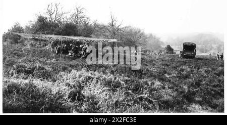 Le Southern Command et le 5e corps de l'armée britannique mènent une démonstration de camouflage à Langford, près de Redlinch, montrant des techniques pour dissimuler des équipements et des positions militaires. Banque D'Images