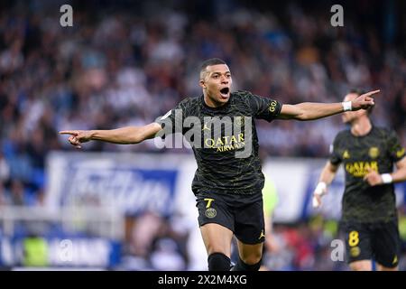 Photo du 21 mai 2023 montrant Kylian Mbappe célèbre son but après avoir marqué lors du match de Ligue 1 de football (soccer) entre AJ Auxerre (AJA) et le Paris Saint Germain (PSG) au stade Abbe Deschamps à Auxerre, France. Selon Mundo Deportivo, l’organisme autonome de la région de Madrid est sur le point de promulguer la « Loi Mbappe » dans le but d’aider l’équipe à acquérir la superstar, qui a 25 ans. Mbappe devrait recevoir un gros salaire et pourrait potentiellement établir un record mondial en tant que bonus de signature, même si le déménagement sera formellement un transfert gratuit. En conséquence, il sera pu Banque D'Images