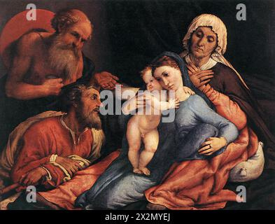 Sainte famille avec Saint Jérôme et Sainte Anne est une peinture à l'huile sur toile signée et datée de 1534 de l'artiste italien Lorenzo Lotto (vers 1480-1556). Banque D'Images