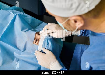 Chirurgien en robe d'hôpital effectuant une chirurgie de précision. Banque D'Images