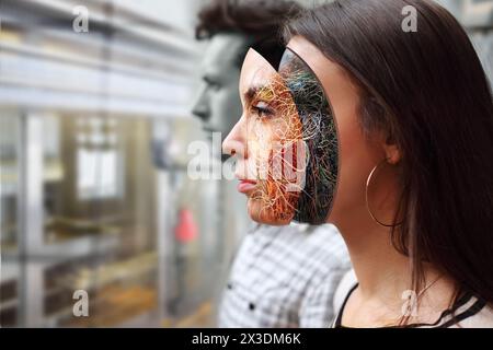 Сollage cyborg femme et homme en usine pour la production de robots, concept d'intelligence artificielle, gros plan, vue de profil Banque D'Images