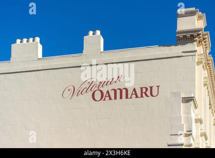 Panneau victorien Oamaru sur le côté du bâtiment, Thames Street, Oamaru, Otago, Île du Sud, nouvelle-Zélande Banque D'Images