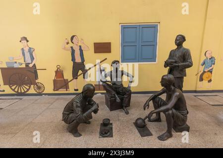 Asie, Singapour, Chinatown, Nankin Street, statues représentant la vie historique Banque D'Images