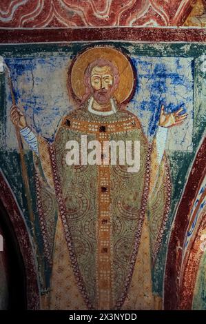 Détail d’un cycle de fresques sur la vie de Saint Hermagoras (Sant’Ermagora), peint vers 1180 après JC, dans la crypte de la Basilique di Santa Maria Assunta in Aquileia, Friuli Venezia Giulia, Italie. Hermagoras, choisi au Ier siècle de notre ère par Saint Marc l'évangéliste pour diriger les chrétiens d'Aquilée, fut le premier évêque de la ville. Banque D'Images