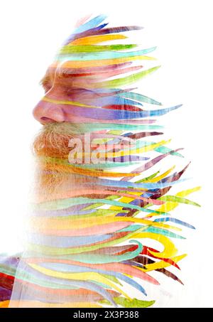 Portrait d'un vieil homme fusionné avec une peinture d'herbe colorée en peinture Banque D'Images