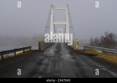 Pont suspendu de Laugaras sur la rivière Hvítá, Islande Banque D'Images