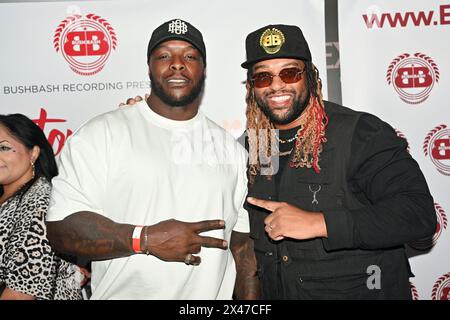 LONDRES, ANGLETERRE - AVRIL 30 : Adebayo Akinfenwa, Ortise Williams assiste à la soirée d'ouverture de 'The Story So Far' au Genesis Cinema | Mile End, Londres, Royaume-Uni. Crédit : Voir Li/Picture Capital/Alamy Live News Banque D'Images