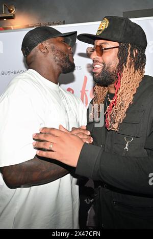 LONDRES, ANGLETERRE - AVRIL 30 : Adebayo Akinfenwa, Ortise Williams assiste à la soirée d'ouverture de 'The Story So Far' au Genesis Cinema | Mile End, Londres, Royaume-Uni. Crédit : Voir Li/Picture Capital/Alamy Live News Banque D'Images