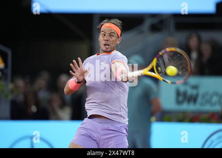 Rafael Nadal, Espagnol, en action contre Jiri Lehecka, Tchéquie, lors du Mutua Madrid Open 2024, ATP Masters 1000 et WTA 1000, tournoi de tennis le 30 avril 2024 au Caja Magica de Madrid, Espagne Banque D'Images