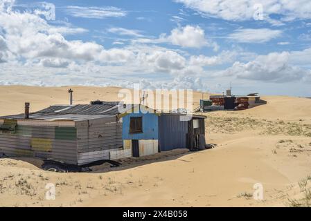 ville cachée dans les dunes de sable Banque D'Images