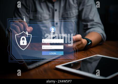 Un utilisateur se connecte en toute sécurité à un compte en ligne protégé, garantissant ainsi la confidentialité et la cybersécurité. Banque D'Images