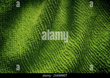 Un fond de texture de serviette de nettoyage en microfibre verte. Gros plan. Banque D'Images