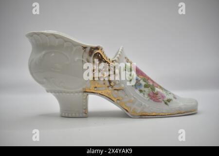 chaussure en porcelaine de collection antique Banque D'Images