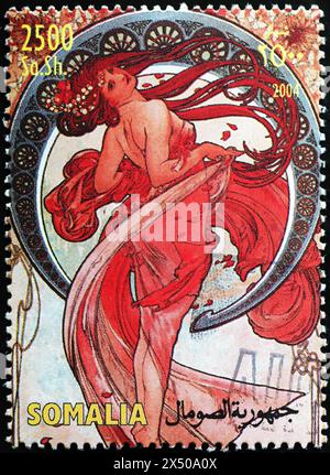 Belle illustration par Alfons Mucha sur timbre de Somalie Banque D'Images