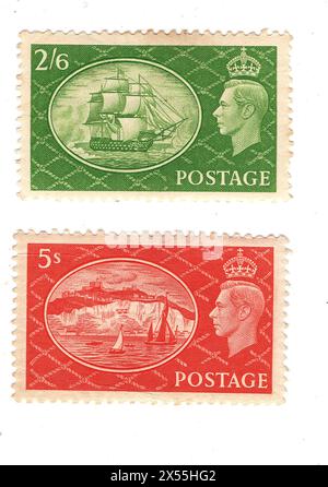 Une paire de timbres-poste à la menthe de grande valeur, King George VI de Grande-Bretagne sur fond blanc. Banque D'Images