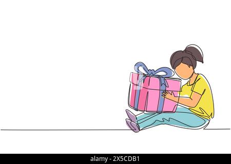 Continue d'une ligne dessinant joyeuse fille assise et embrassant une grande boîte cadeau avec un noeud de ruban enveloppé devant elle dans les bras. Le petit enfant accepte l'anniversaire Illustration de Vecteur