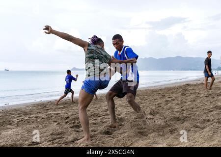 Entraînement au silat Pencak, plage de Dili, Timor-Leste Banque D'Images