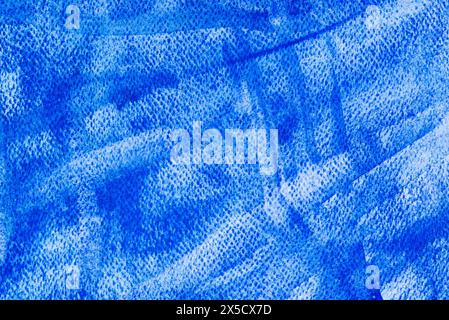 fond d'aquarelle peint en bleu sur texture de papier Banque D'Images