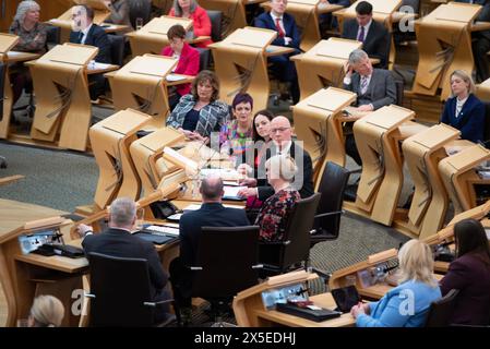 Édimbourg, Écosse, Royaume-Uni. 9 mai 2024. PHOTO : John Swinney MSP, premier ministre d'Écosse et chef du Parti national écossais (SNP). Le premier ministre écossais nouvellement élu, John Swinney MSP, prend sa première session de la session hebdomadaire des questions des premiers ministres (FMQ) au sein du Parlement écossais à Holyrood. Crédit : Colin d Fisher crédit : Colin Fisher/Alamy Live News Banque D'Images