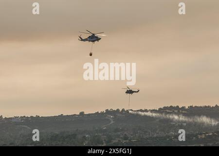 Limassol, Limassol, Chypre. 9 mai 2024. Des hélicoptères ont été vus pendant l'incendie, à Limassol (Chypre), en mai. 9, 2024. Un feu de forêt a éclaté dans la zone industrielle d'Ipsonas, à quelques kilomètres du centre de Limassol, qui a brûlé principalement de la végétation sauvage. (Crédit image : © Kostas Pikoulas/ZUMA Press Wire) USAGE ÉDITORIAL SEULEMENT! Non destiné à UN USAGE commercial ! Banque D'Images