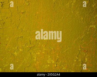 Texture abstraite de peinture rouge-brun épluchant minable sur le mur. Banque D'Images
