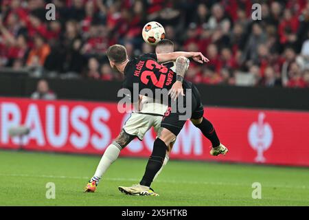 Adam Hlozek (Bayer 04 Leverkusen)Gianluca Mancini (Roma) lors du match de l'UEFA Europa League entre Bayer Leverkusen 2-2 Roma au stade BayArena le 09 mai 2024 à Leverkusen, Allemagne . Crédit : Maurizio Borsari/AFLO/Alamy Live News Banque D'Images