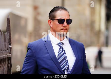 Le policier de la Metropolitan police Perry Lathwood arrive à la City of London Magistrates' court, où il est accusé de voies de fait par coups en relation avec des blessures causées au bras d'une femme lors d'une arrestation pour évasion fiscale injustifiée le 21 juillet 2023 à Croydon. PC Lathwood est attaché au commandement de la police routière du met. Date de la photo : vendredi 10 mai 2024. Banque D'Images