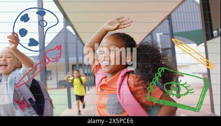 Image des icônes de l'école au-dessus de divers écoliers en cours d'exécution Banque D'Images