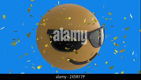 Image numérique de confettis dorés tombant sur le visage portant des lunettes de soleil emoji sur fond bleu Banque D'Images